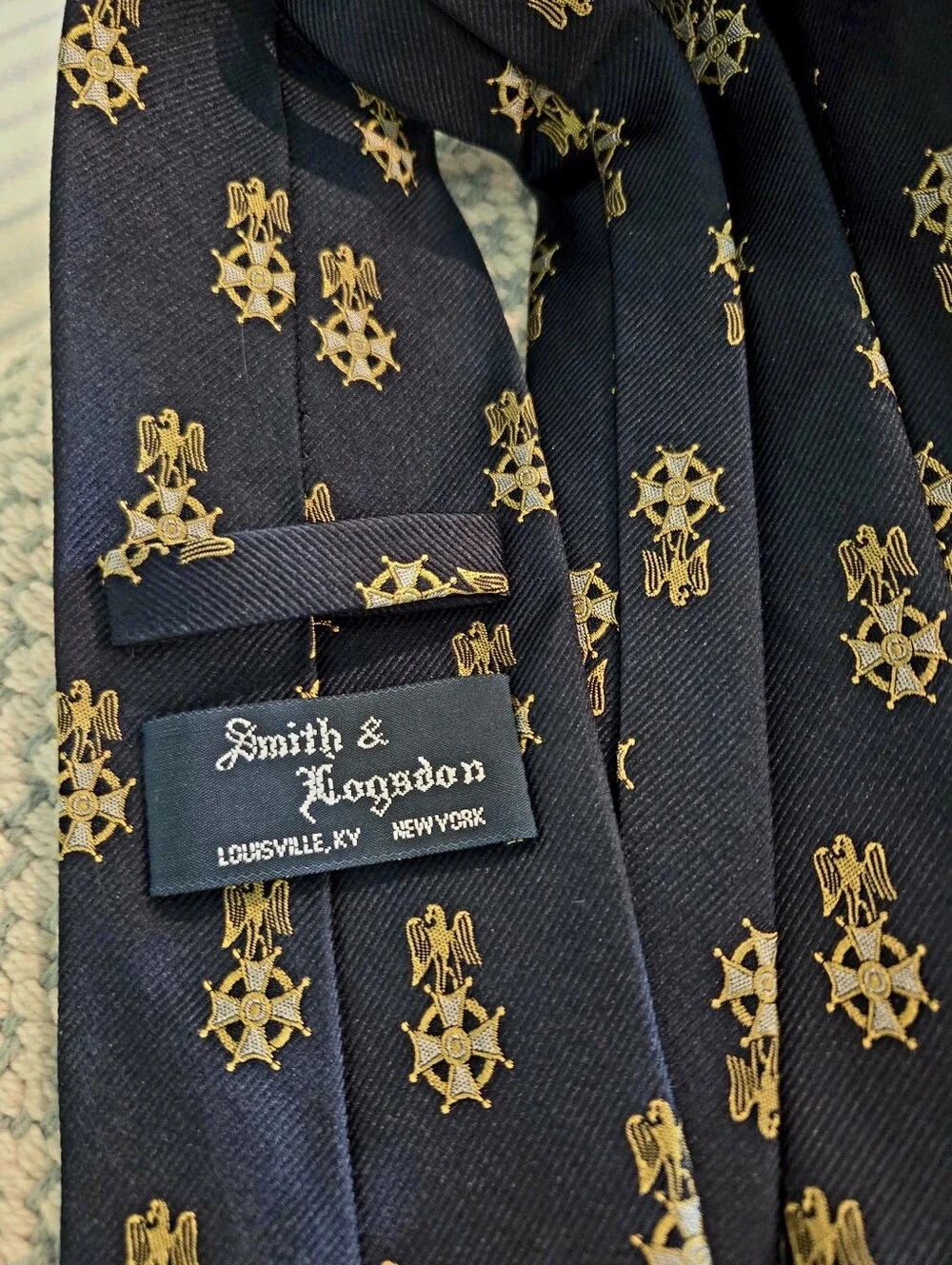 Smith & Logsdon Navy Necktie with Gold Crest Motif